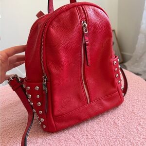 Chic Red Backpack with Silver Accents